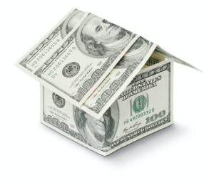 a house made out of money on a white background