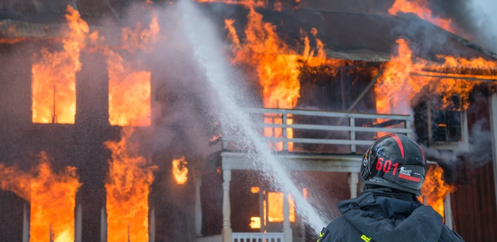 fireman watering fire